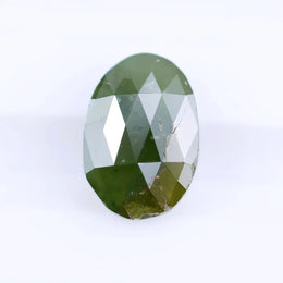 1.55 Ct natural olive green oval cut diamond loose gemstone with visible natural inclusions and faceted surface