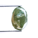 1.55 Ct natural olive green oval cut diamond loose gemstone with visible natural inclusions and faceted surface