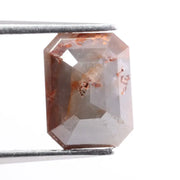 Natural diamond in raw and polished form displaying true earth-mined characteristics. This diamond highlights natural inclusions, clarity variations