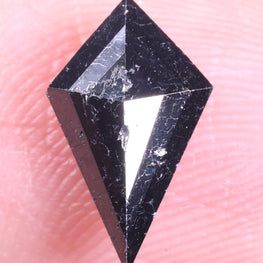 Black diamond on a finger