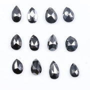 Natural Pear Cut Fancy Black Diamond Engagement Ring, how can you tell if a diamond is real, diamonds in the rough, raw diamonds, lab grown vs natural diamond, natural diamond vs lab grown.