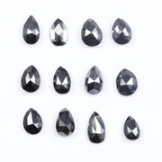 Natural Pear Cut Fancy Black Diamond Engagement Ring, how can you tell if a diamond is real, diamonds in the rough, raw diamonds, lab grown vs natural diamond, natural diamond vs lab grown.