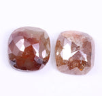 Two brown diamond on a white background