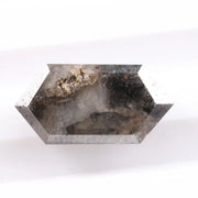 Collection of natural diamonds including oval, elongated cushion, and Dutch marquise cuts. Shows real diamonds formed deep within the earth