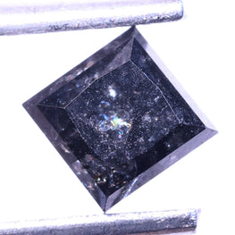 Square-cut diamond with a stick on a white background