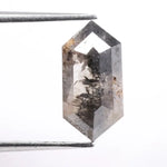 Collection of natural diamonds including oval, elongated cushion, and Dutch marquise cuts. Shows real diamonds formed deep within the earth