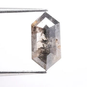 Collection of natural diamonds including oval, elongated cushion, and Dutch marquise cuts. Shows real diamonds formed deep within the earth