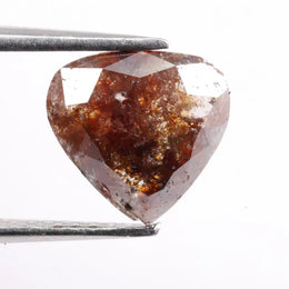 Natural diamond jewelry sourced from ethical mines including Canadian natural diamonds. Displays engagement rings, earrings, and necklaces crafted with real diamonds