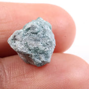 Irregular diamond shape raw diamond stone featuring smooth diamonds areas and rough crystal edges. This rough uncut diamond is perfect for loose diamond buyers