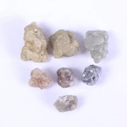 rough uncut diamond, smooth diamonds, how to tell natural vs lab diamond, is lab grown diamond better than natural, black faceted diamond