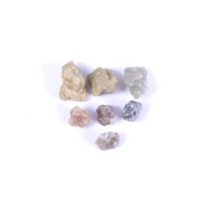 rough uncut diamond, smooth diamonds, how to tell natural vs lab diamond, is lab grown diamond better than natural, black faceted diamond