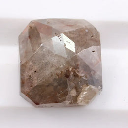 Rough natural diamond shown in its raw uncut form, revealing authentic crystal structure formed over billions of years.