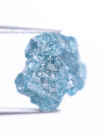 Blue rough in a glass tube on a white background