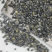 black cube shaped raw diamond with natural rough texture for custom jewelry