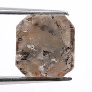 Rough natural diamond shown in its raw uncut form, revealing authentic crystal structure formed over billions of years.