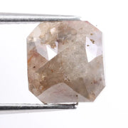 Rough natural diamond shown in its raw uncut form, revealing authentic crystal structure formed over billions of years.