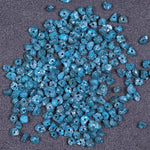 raw uncut diamond showing what does diamond look like before it is cut with natural blue diamond blue diamond stud earrings and blue diamond wedding band black faceted diamond