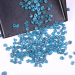 raw uncut diamond showing what does diamond look like before it is cut with natural blue diamond blue diamond stud earrings and blue diamond wedding band black faceted diamond