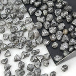 grey raw diamond specimen with natural rough uncut surface for collectors