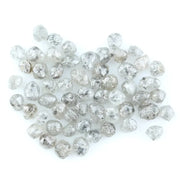 Natural grey white rough diamond lot with mixed silver smoky tones, raw uncut loose diamond crystals displayed on white background.