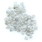 Natural grey white rough diamond lot with mixed silver smoky tones, raw uncut loose diamond crystals displayed on white background.