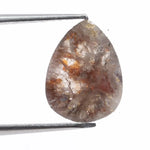 Natural diamond jewelry including rings, earrings, and bracelets displayed to explain price differences between natural and lab grown diamonds.
