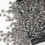 grey earth mined diamond with a natural uncut rough surface for jewelry making
