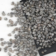 grey earth mined diamond with a natural uncut rough surface for jewelry making