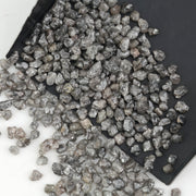 grey earth mined diamond with a natural uncut rough surface for jewelry making