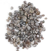 brown grey natural diamond with an untreated rough surface for jewelry creation