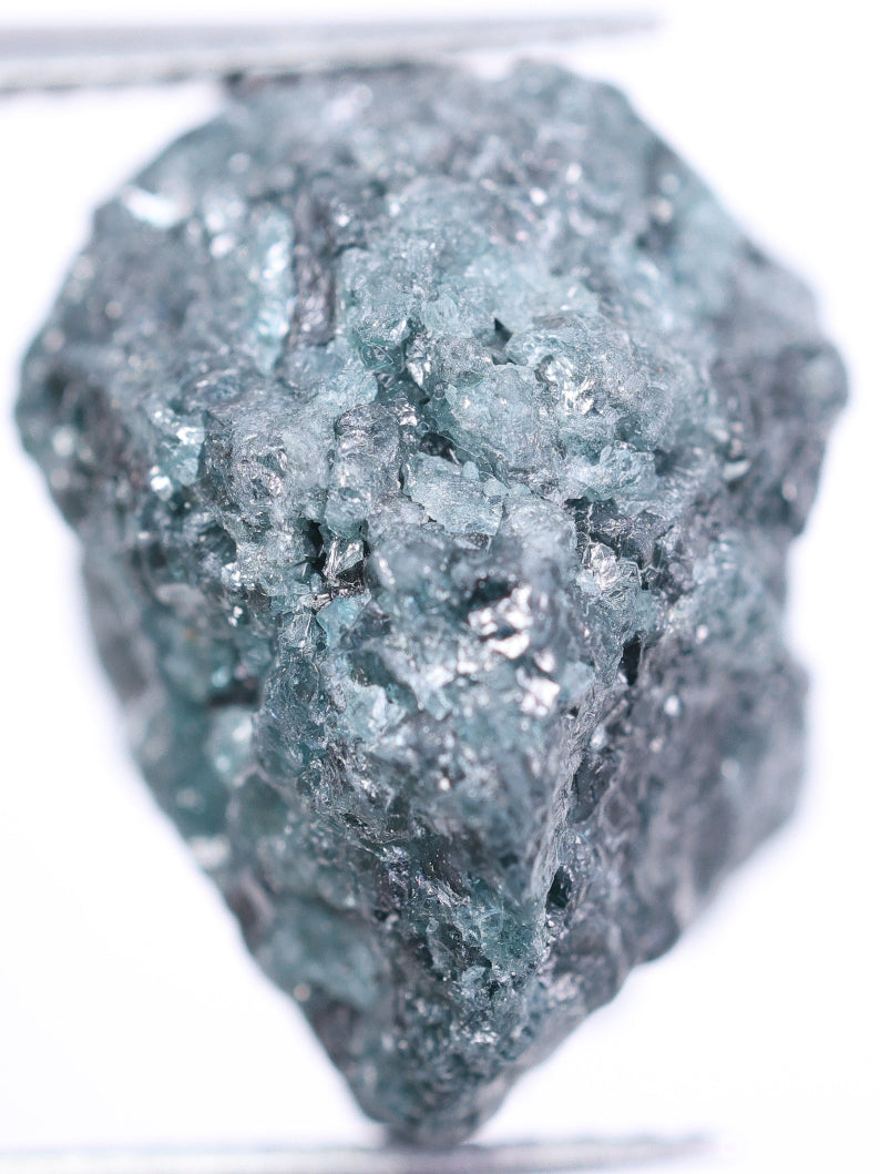 Raw diamond on a white background