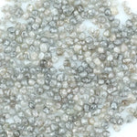 Natural gray silver diamond rough crystal with metallic shine and raw uncut texture