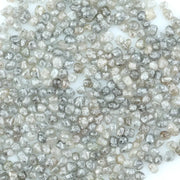 Natural gray silver diamond rough crystal with metallic shine and raw uncut texture