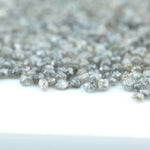 Natural gray silver diamond rough crystal with metallic shine and raw uncut texture