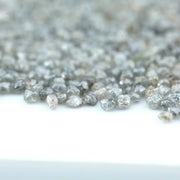 Natural gray silver diamond rough crystal with metallic shine and raw uncut texture