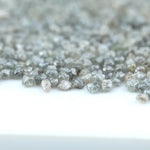 Natural gray silver diamond rough crystal with metallic shine and raw uncut texture
