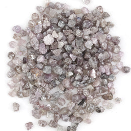 natural pink raw diamond with an unpolished rough surface for jewelry design