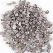 natural pink raw diamond with an unpolished rough surface for jewelry design