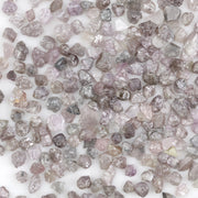 natural pink raw diamond with an unpolished rough surface for jewelry design