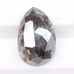 Natural diamonds displayed in various cuts and colors, showcasing real earth-mined gemstones formed over billions of years.