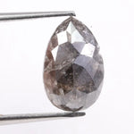 Natural diamonds displayed in various cuts and colors, showcasing real earth-mined gemstones formed over billions of years.