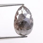 Natural diamonds displayed in various cuts and colors, showcasing real earth-mined gemstones formed over billions of years.