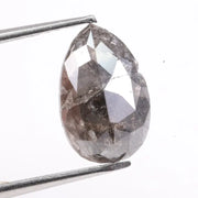 Natural diamonds displayed in various cuts and colors, showcasing real earth-mined gemstones formed over billions of years.