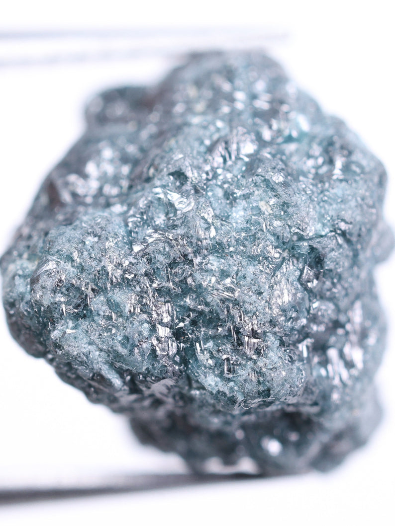 Raw diamond on a white background