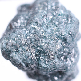 Raw diamond on a white background