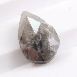 Pear cut natural diamond ring showcasing sharp edges, exceptional brilliance, and timeless elegance. This earth-mined natural diamond ring is perfect for engagement and fine jewelry
