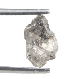 1.78 carat unpolished grey diamond with a natural rough surface for a real gold ring