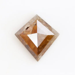 0.39 Ct kite cut brown grey natural diamond with sharp angles and modern luxury appeal