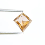 0.39 Ct kite cut brown grey natural diamond with sharp angles and modern luxury appeal