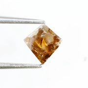 0.39 Ct kite cut brown grey natural diamond with sharp angles and modern luxury appeal